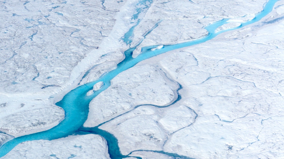 Rivers of meltwater flow across the Greenland ice sheet. Where their cold freshwater enters the ocean may make a difference for the global climate, a new study suggests. M. Tedesco/Columbia University