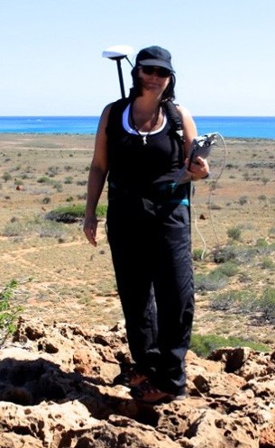 Maureen Raymo, using GPS and other instruments to map ancient shorelines.