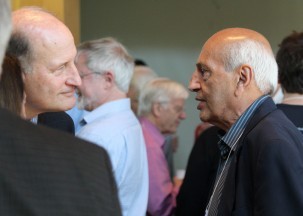 Former Lamont Director Manik Talwani, right, speaks with geologist Roger Buck during a break.