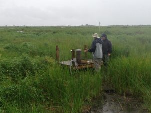 Tim and Keith examining Well 3, the shallowest well.