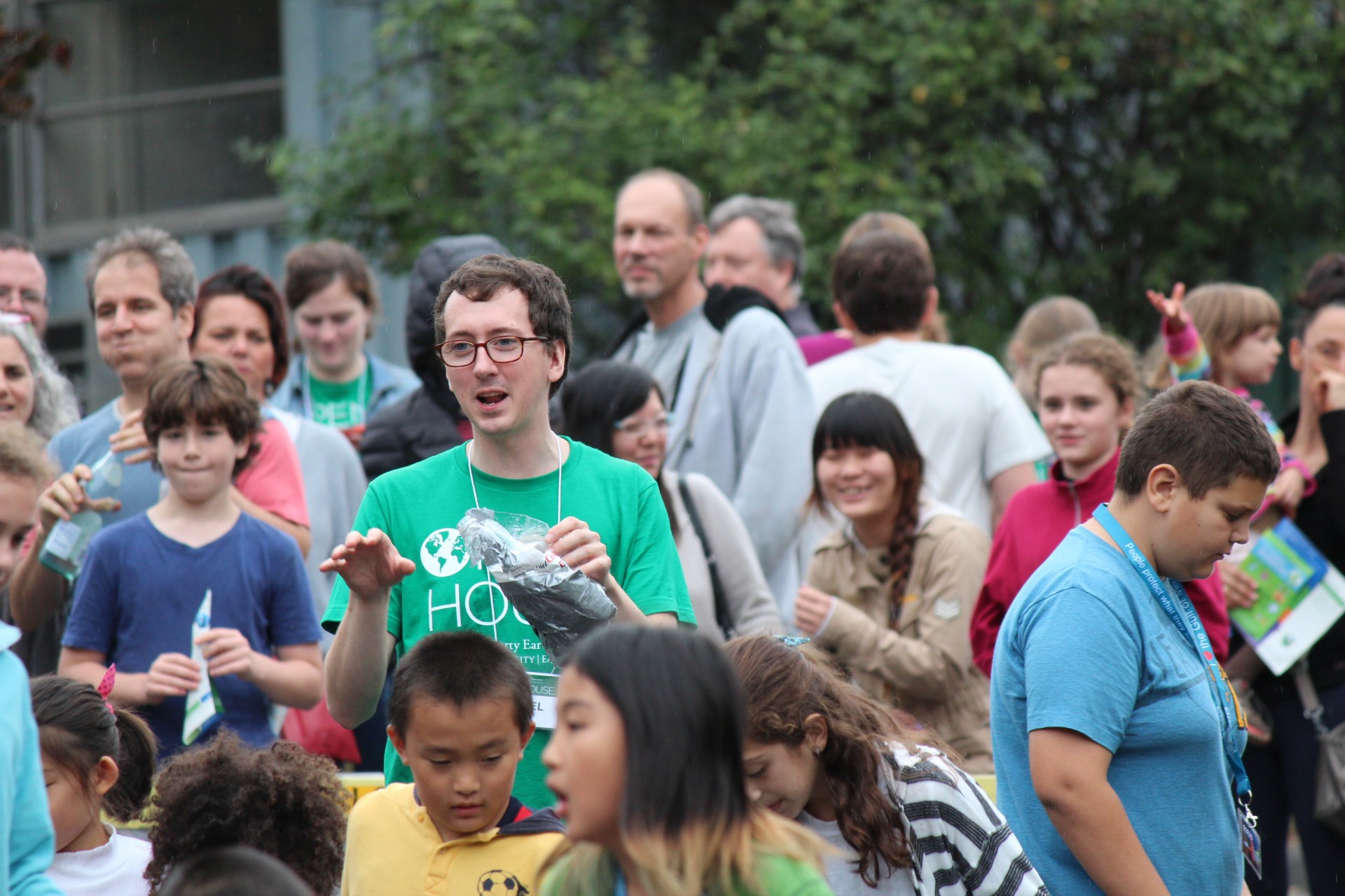 Daniel holds what was left of the Coke bottle after the Coke-and-Mentos eruption. Open House 2016