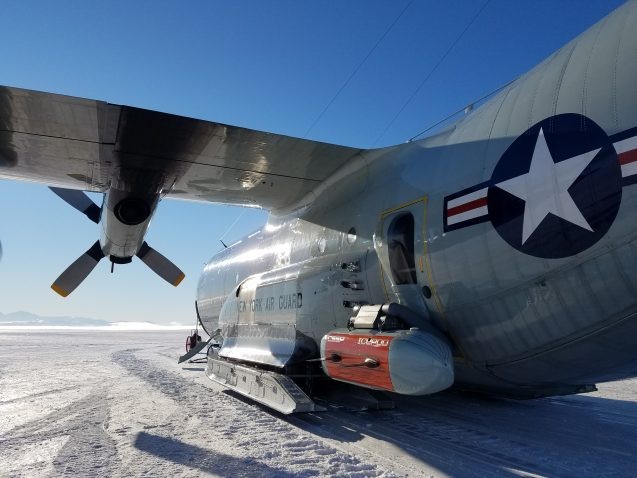 IcePod on the side of the New York Air National Guard LC130 Skier 92, on the ice shelf in Antarctica. (Photo N. Frearson) 
