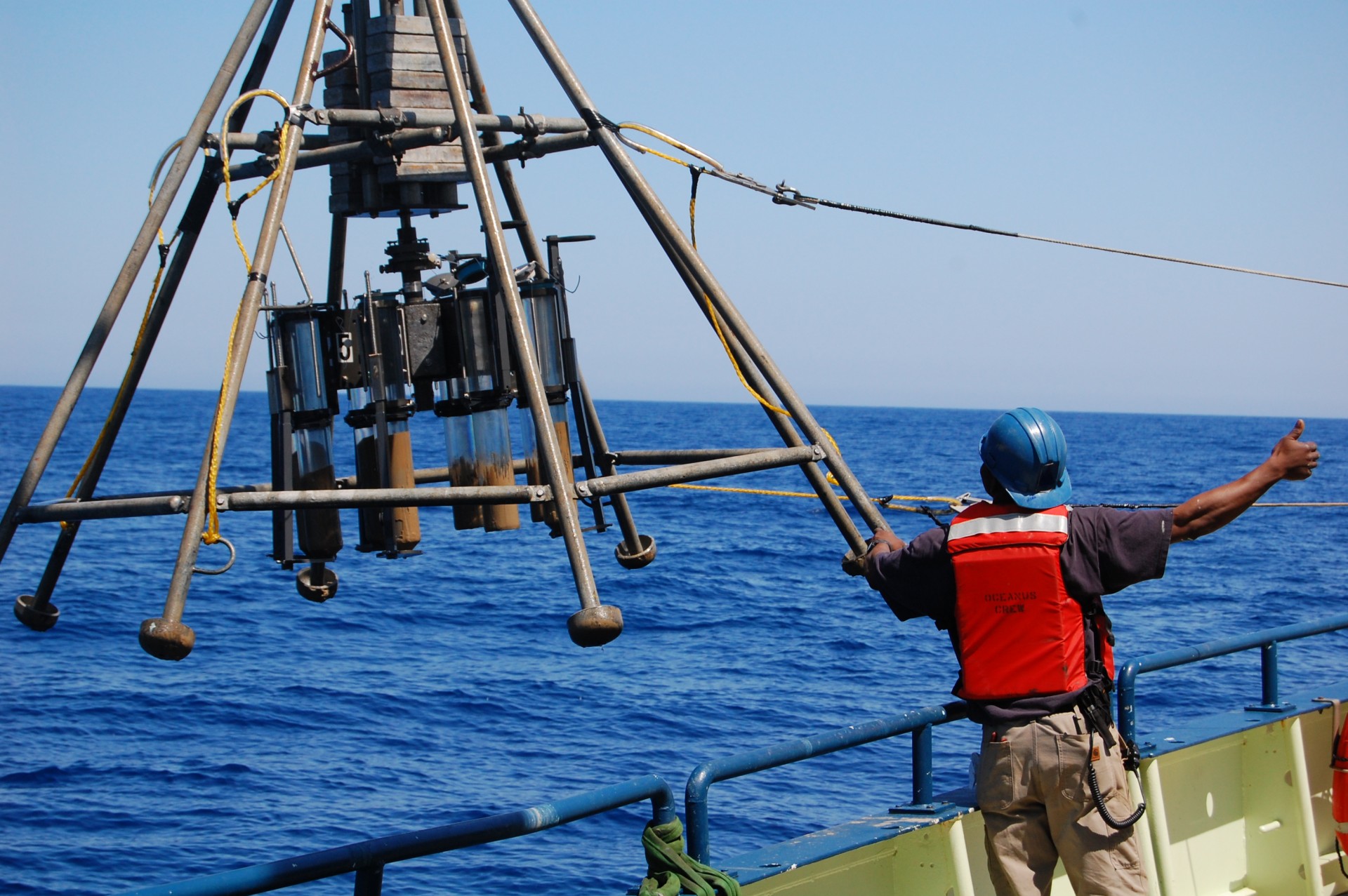 A multicorer device being lowered into the ocean takes eight one-foot cores from the seafloor. Scientists analyze such cores for clues to the climate of the past several thousand years. Image: Peter deMenocal
