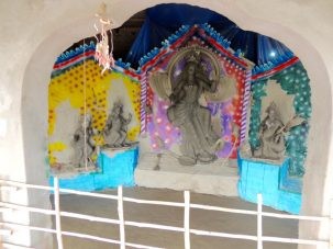 A stopped to pay our respects to the small shrine in the schoolyard to Saraswati, the Hindu goddess of knowledge and education.