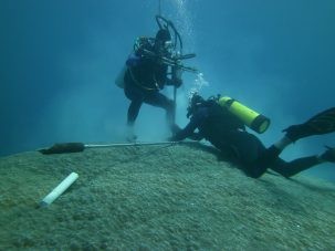 Scientists collect coral reef core samples near American Samoa. Photo: Brad Linsley