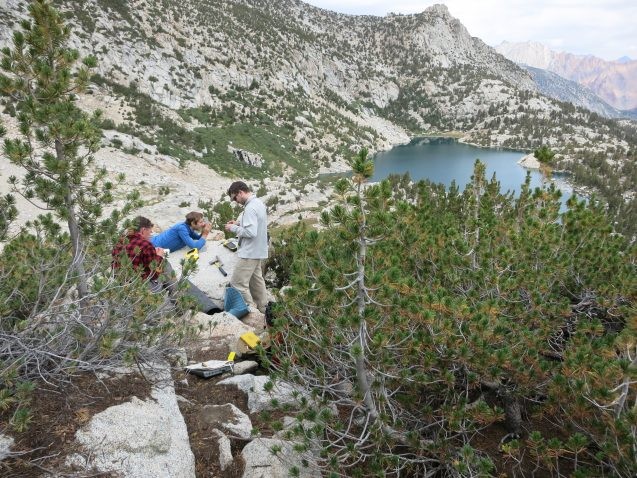 From left, Aaron Putnam, Adam Hudson and Ben Hatchett calculate the exact position of a boulder they've sampled above Baboon Lakes in the Sierras of central California. Photo: David Funkhouser