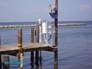 A NOAA water level monitoring station with an acoustic sensor on Dauphin Island, Alabama. Such tide gauges along the U.S. coast give scientists a baseline of sea level changes dating at least to the 19th century. Photo: NOAA/courtesy Morgan McHugh