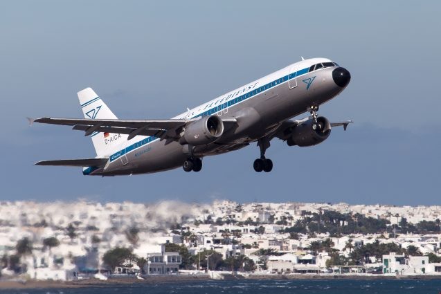 Due to warming climate, some aircraft may soon have a hard time getting off the ground in the heat of the day. Here, a jet takes off from the Canary Islands. (Bruno Gelger, via flickr)