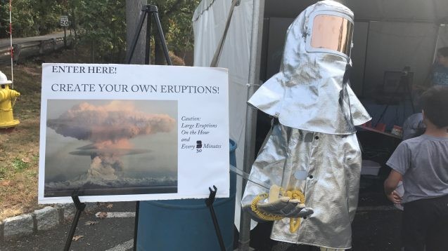 volcano heat suit and sign about eruptions