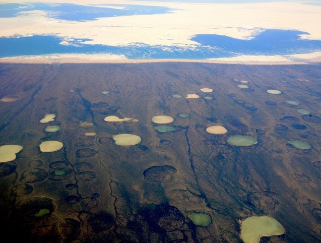 thawing permafrost forms ponds in canada