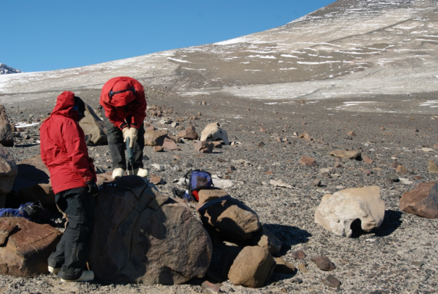 scientists taking rock samples