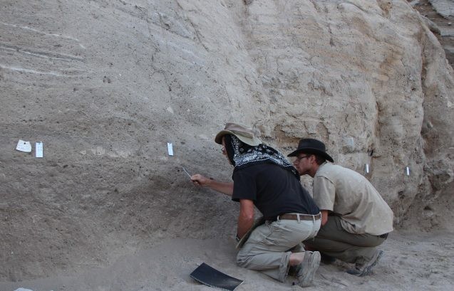 archaeologists taking samples