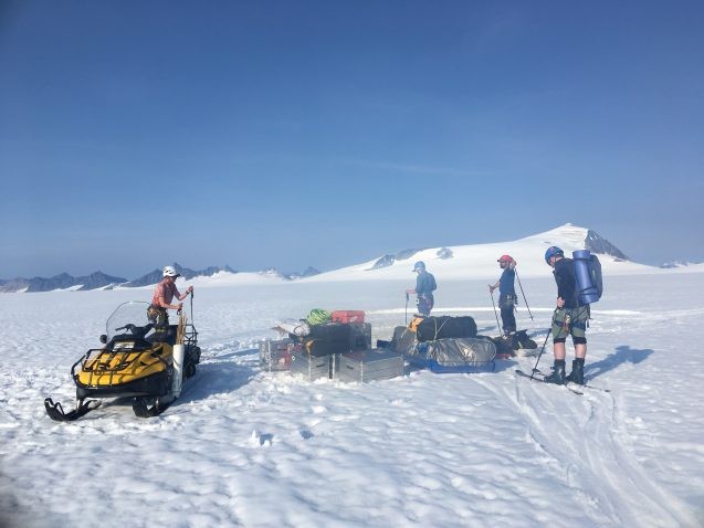 snowmobile and equipment on ice