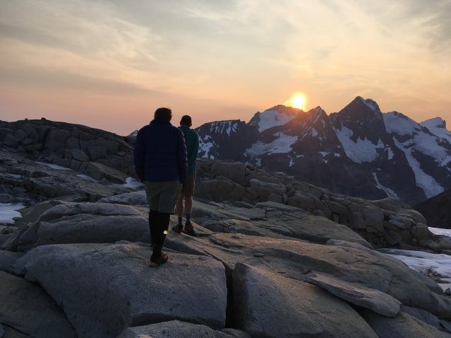sunset over rocks and ice