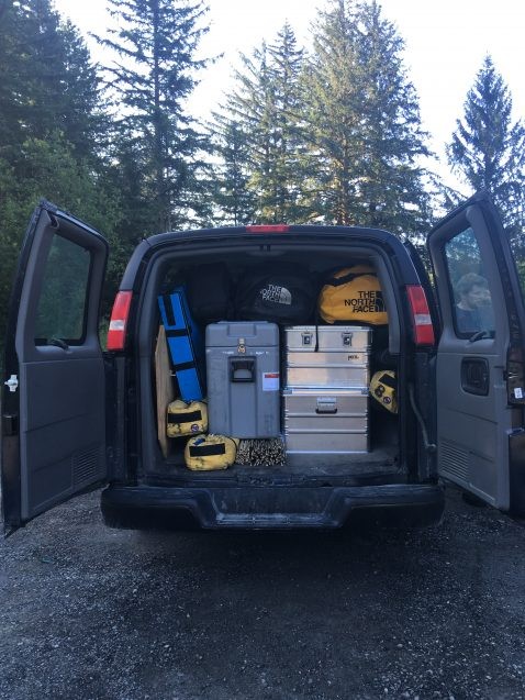 van packed with cases and bags