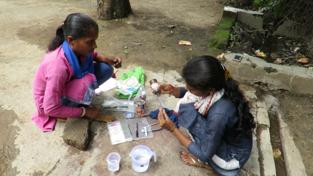 students testing water