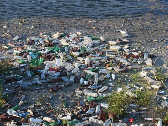 Plastic trash floating in a river