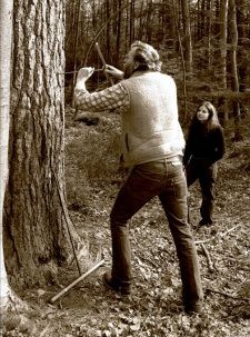 jacoby taking a tree ring core while d'arrigo watches