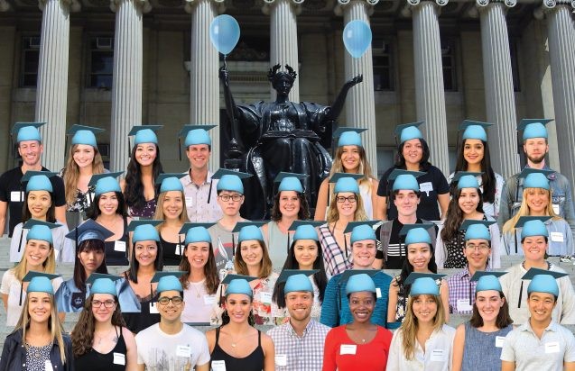 students with columbia alma mater backdrop