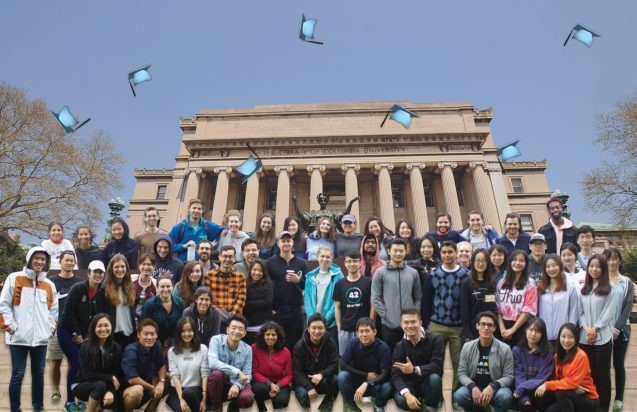 students with columbia backdrop