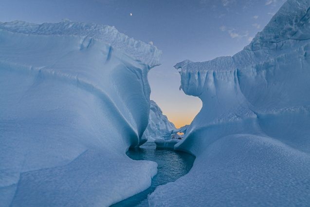 wall of ice with water flowing through