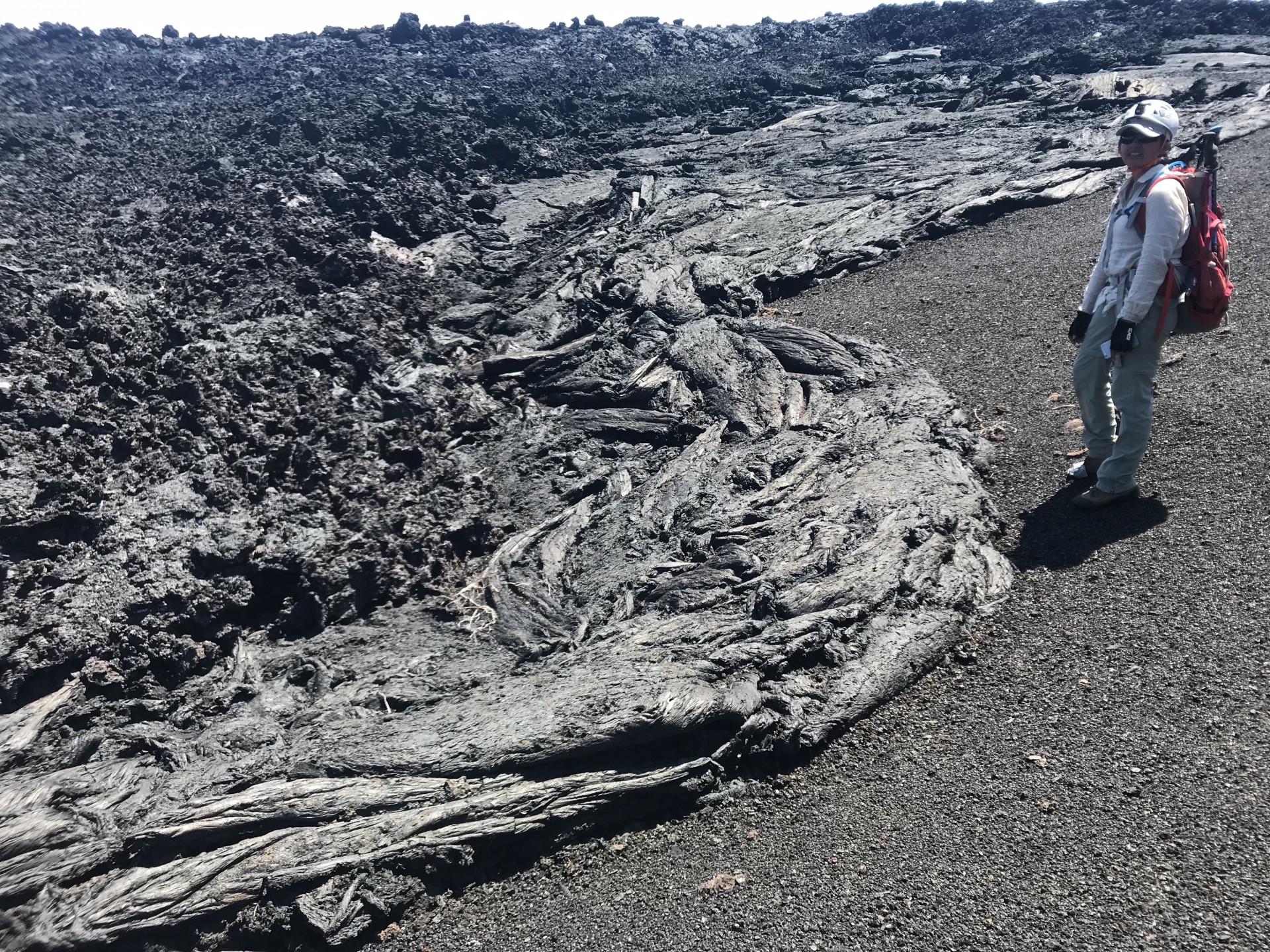 A variety of lava types near the Sierra Negra volcano in the Galapagos Islands, Ecuador. Photo: Einat Lev 2018 a'a over 2005 pahoehoe