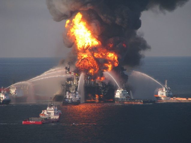 fire boats trying to put out a fire on oil platform