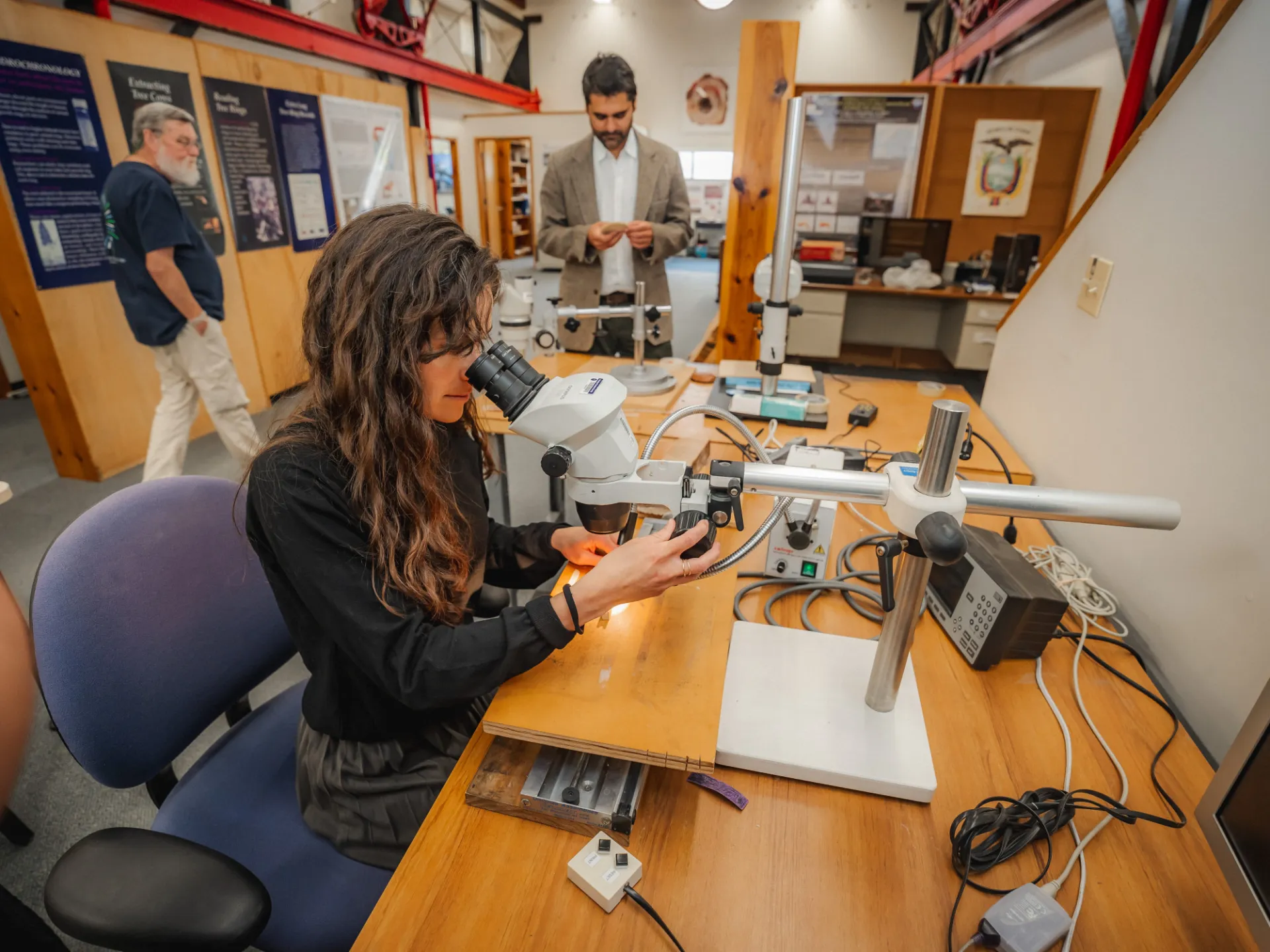 Scientists working in LDEO Tree Ring Lab. Credit: Brandon Vallejo