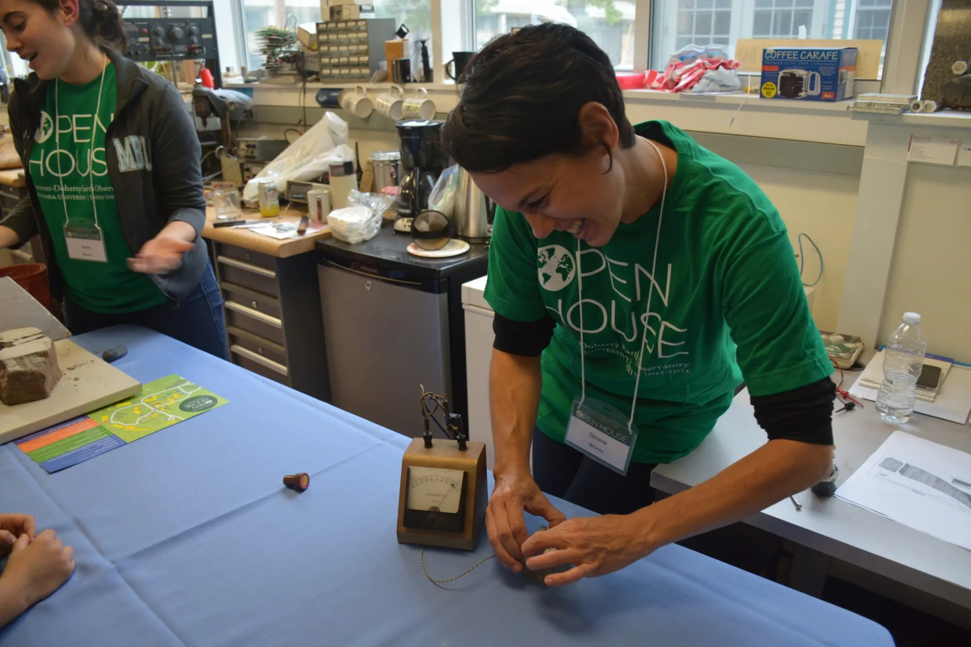 Self-proclaimed rock squeezer Christine McCarthy literally squeezes a rock to amuse the kids at Lamont Open House (2014).