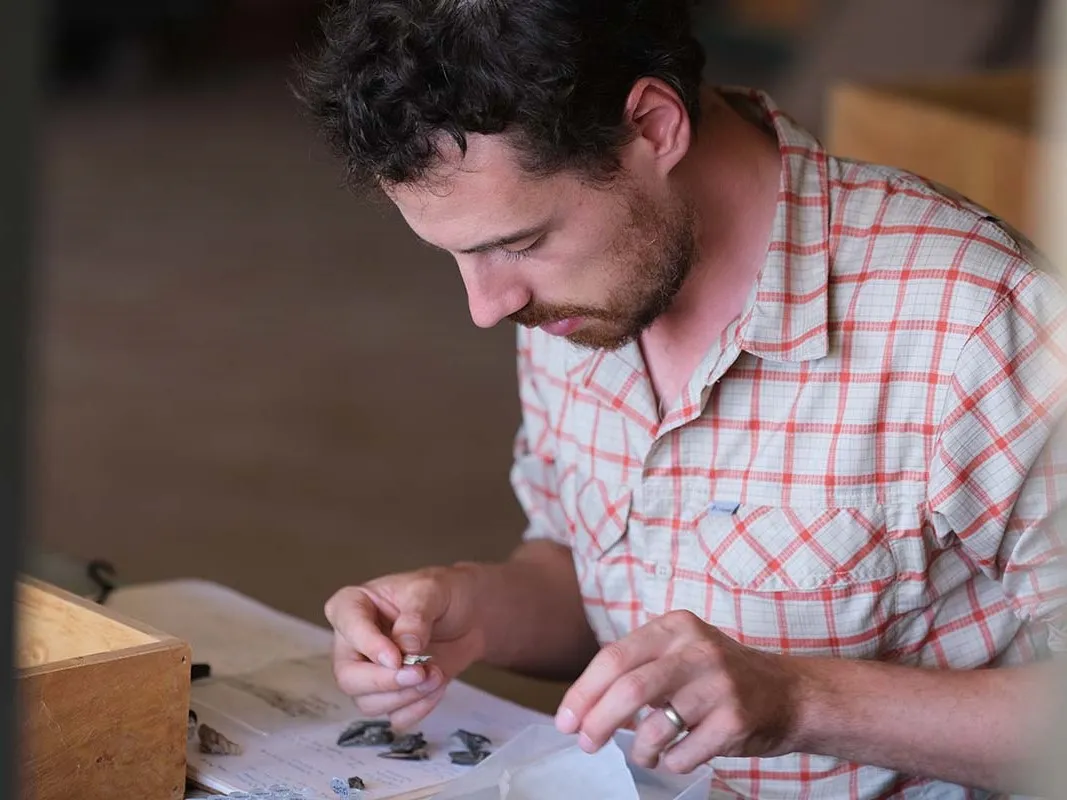 Lead author Daniel Green examines fossil material from Kenya’s Turkana Basin.