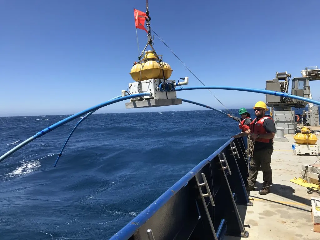 An electromagnetic sensor on its way to the ocean floor to collect data. Credit: Samer Naif/ Electromagnetic Geophysics Lab