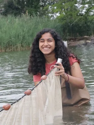 After spending the summer catching and identifying fish, Janice Yohannan became an expert in the art of seining, a fishing technique that requires pulling a net through the water where the bottom edge is held down by weights and the top edge is buoyed by floats. 