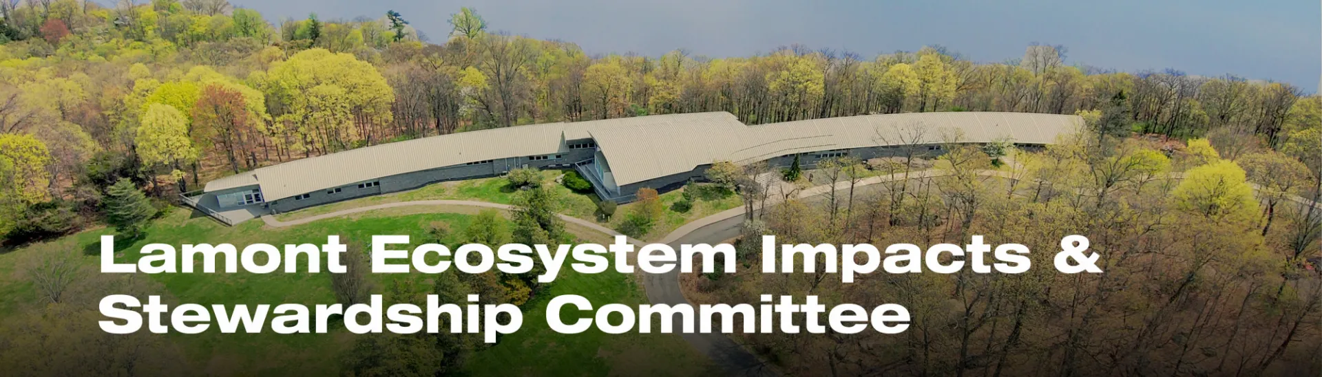 Aerial view of Lamont campus on Hudson River with text Lamont Ecosystem Impacts & Stewardship Committee