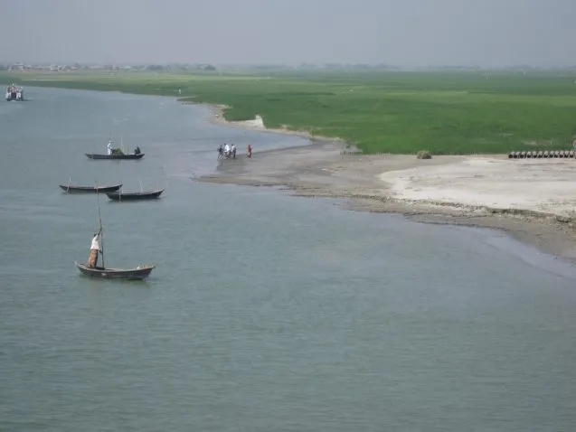 Low-lying land along the river in Bangladesh frequently floods during rainy season. Credit: Kevin Krajick/Earth Institute