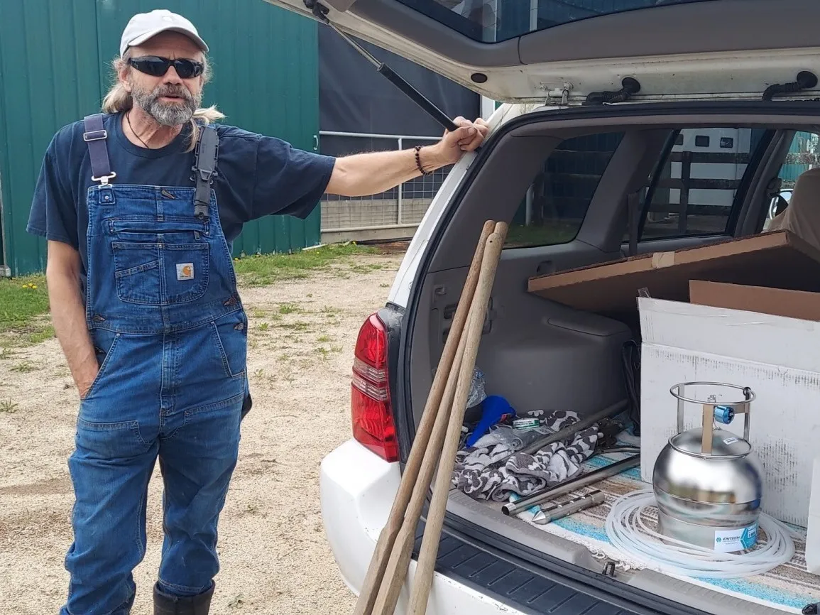 Volunteer scientist Yuri Gorby with one of the low-cost air-pollution sensors used to create a more accurate picture in Belmont County, Ohio. Credit: Leatra Harper/Freshwater Accountability Project