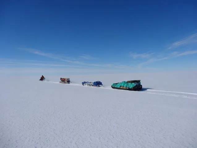 sleds moving across ice