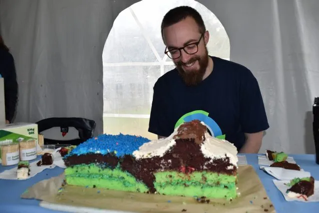 Guy with earth cake 637x425.jpeg