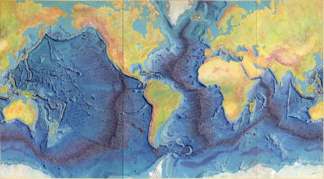 Colorful image of the Heezen-Tharp world ocean floor map showing ocean bathymetry and mid-ocean ridges.