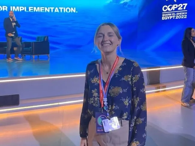 Woman smiling at conference