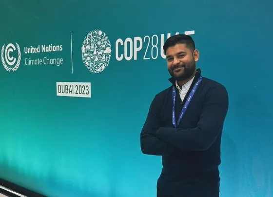 Man smiling at conference