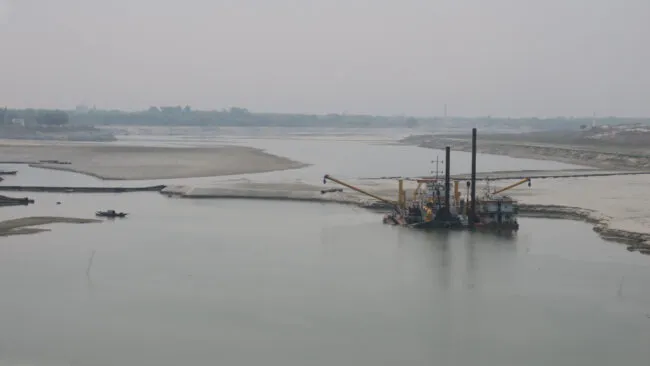 Dredge in a river
