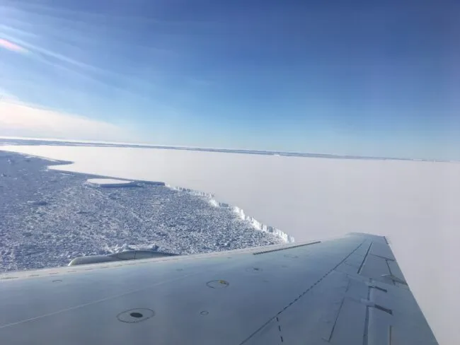 Flying over the A-68 iceberg that broke off the Larsen C Ice Shelf in July 2017 during a 2018 NASA Operation IceBridge campaign. Credit: Caitlin Locke, Lamont-Doherty Earth Observatory
