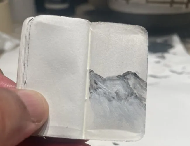 Tiny book with drawings