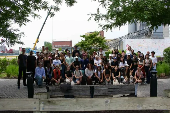 MPA-ESP 26’, professors, FROGG, and program liaisons in front of the Gowanus Canal