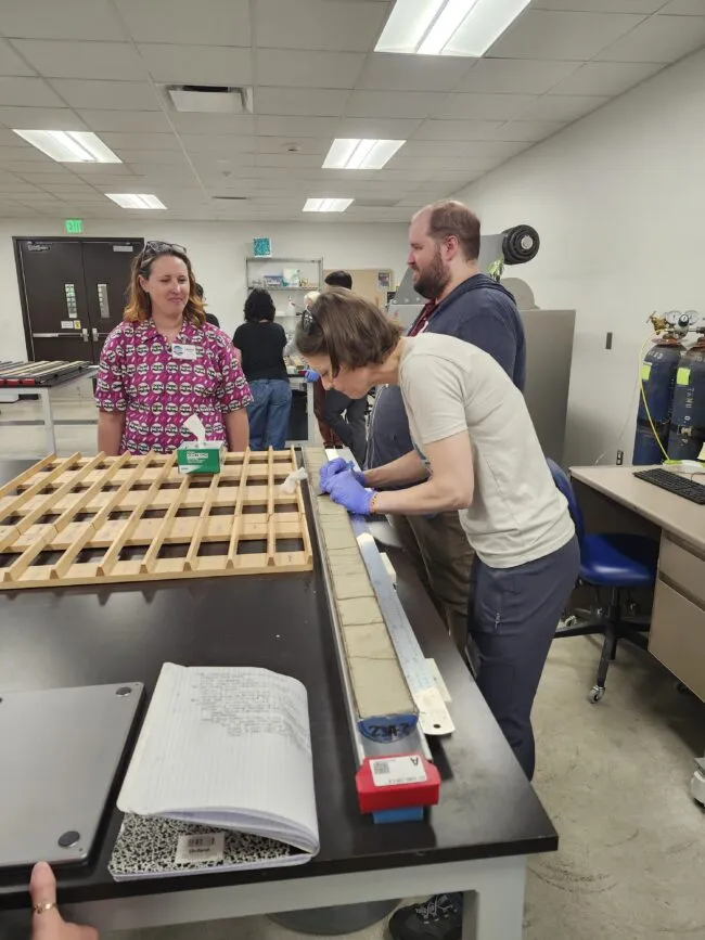 Teachers learning from scientists in the lab