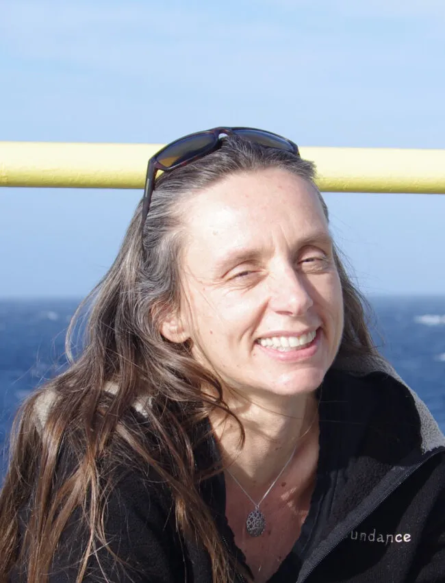 A photo of Gisela Winckler aboard a ship at sea 