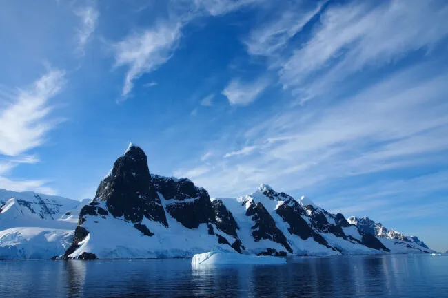 Coastal Antarctica with iceberg in foreground