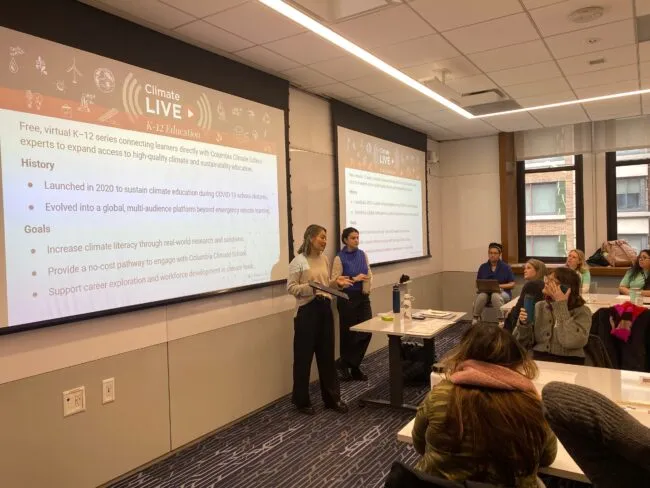 Laurel Zaima-Sheehy and Emma Kyzivat giving a presentation