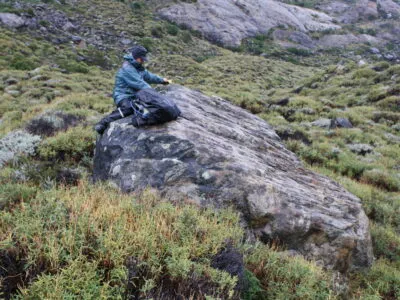 Mike Kaplan Sampling A Boulder In The Lago Argentino Area Of Patagonia 400x300.jpg