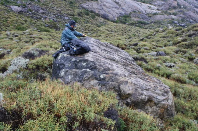 Mike Kaplan sampling a boulder in the Lago Argentino area of Patagonia
